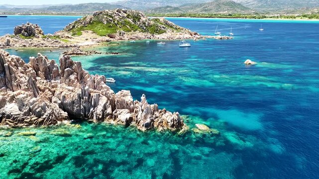 Aerial drone view of Isolotto d'Ogliastra with turquoise sea, Lotzorai, Ogliastra, Sardinia, Italy