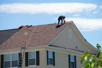 workers are roofing the house © Victor