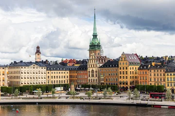 Stockholm Kornhamnstorg Square in Gamla Stan with German Church Tower © Reelistic