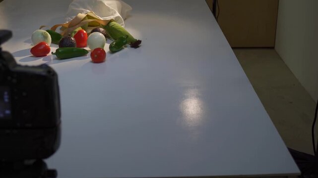 Behind the scenes of a food photoshoot with fresh vegetables