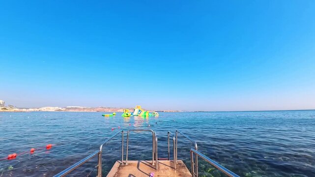 Walking Along Pier Toward Floating Water Park, Bugibba, Malta - POV VIDEO - NO AUDIO