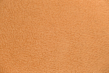 Orange Fleece Fabric Texture Close-Up Background © Pelle