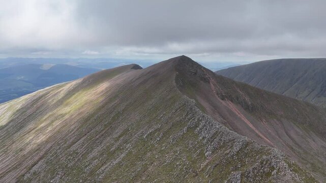 Aerial drone push forward shot of CMD route to Ben Nevis in Scotland.