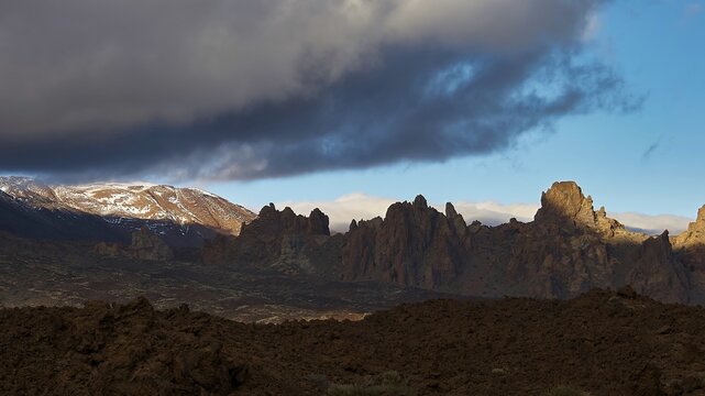 Llano de Ucanca, Dramatic clouds over rocky mountains with shadows and light effects, Teide, Parque Nacional del Teide, Teide National Park, volcano, volcanism, UNESCO World Heritage Site, Tenerife, Canary Islands, Spain
