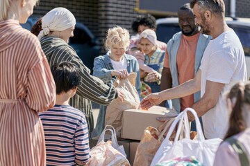 Humanitarian Aid Workers Providing Food Support to Families