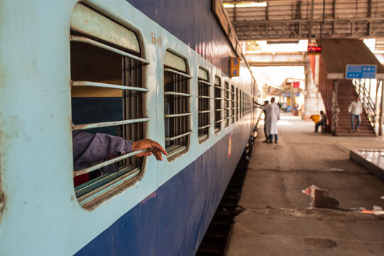 Indian train carriage at a railway station platform in Mumbai