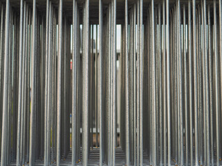 Obraz premium Stack of meta aluminum barriers. Close up. Public event preparations or some kind show or a musical concert.
