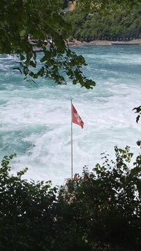 Rheinfall with Suiss Flag.