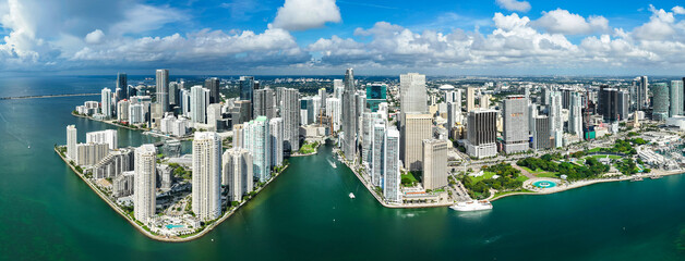 Naklejka premium Skyscraper building architecture. Cityscape skyscraper. Panoramic skyline cityscape. City panorama. City downtown with skyscraper. Aerial Miami panorama. Panoramic Brickell Key aerial view