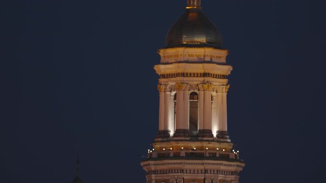 Bell Tower of Kyiv Pechersk Lavra Glowing in Evening Light