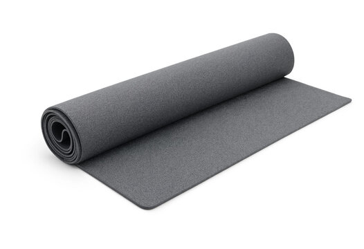 Grey rubber fitness mat partially rolled on white background with exercise stretching training equipment