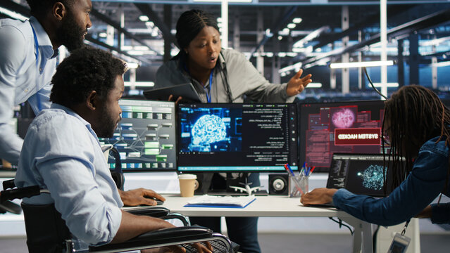 Data center engineering team react to a cyberattack on a computer, securing server equipment and protecting confidential data.