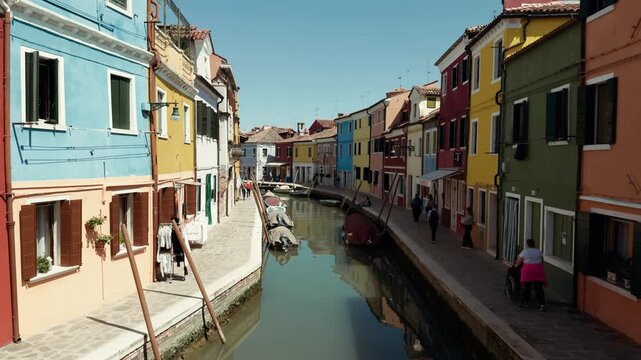 Burano canal lined with brightly colored houses