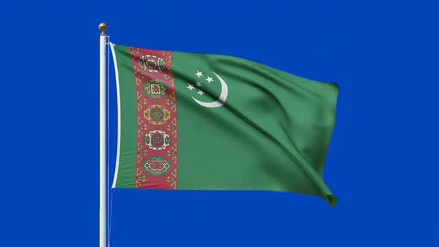 Turkmenistan flag waving proudly in the wind against a blue screen background, a symbol of national pride and identity blowing freely