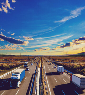  Camiones de carretera, transporte log&iacute;stico, carretera, paisaje del atardecer. Camiones circulando por la autopista bajo un cielo espectacular. Representa la industria de log&iacute;stica, transporte.