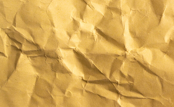 Textura de papel amarillo arrugado con pliegues para fondo abstracto y dise&ntilde;o creativo