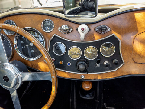 TAVERNES BLANQUES, SPAIN - JUNE 14, 2026.Close up view of vintage wooden instrument panel and gauges in MG TD sports car shows classic design and craftsmanship