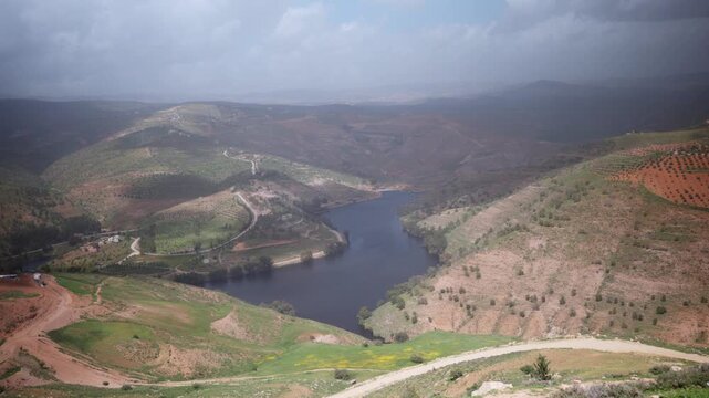 Aerial view of King Talal Dam full of water during spring in Jordan