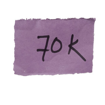 Purple sticky note with handwritten 70k text isolated on a transparent background