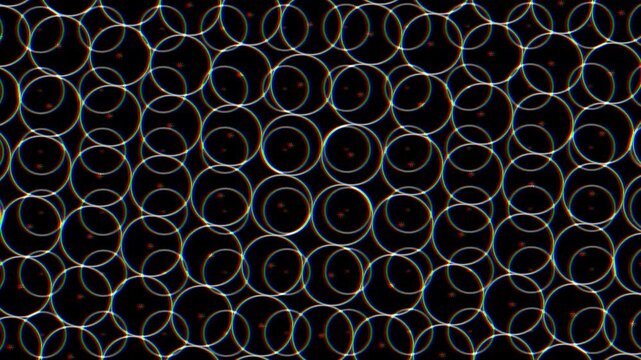 Abstract geometric pattern of overlapping circles with red dots and chromatic aberration effect on black background, motion graphic element