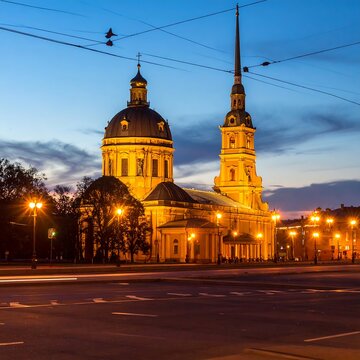 Cathedral Illuminated at Dusk in Urban Setting