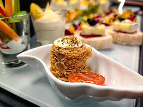 Mini kanafeh in the concept of Osh El Bulbul is served in small portions as an elegant dessert or sweet snack.