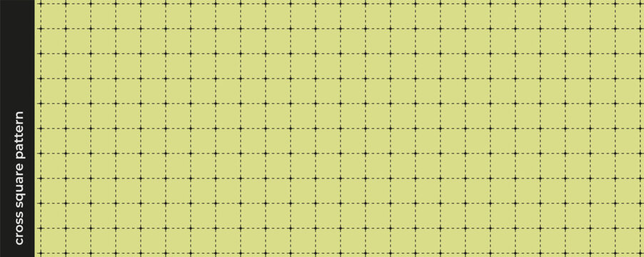 Notebook cross square pattern with dotted lines on light olive green background creating grid for notes and planning.