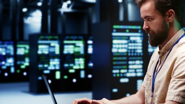 IT programmer prepares recovery documentation in a high tech facility, connecting backup procedures, service restoration and continuity planning.