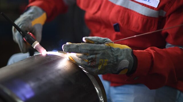 Gas metal arc welding (GMAW, MAG, MIG). MIG welding is a metal shielding gas welding process (GMAW) with inert gas, in which the light arc burns between a continuously fed melting wire electrode.