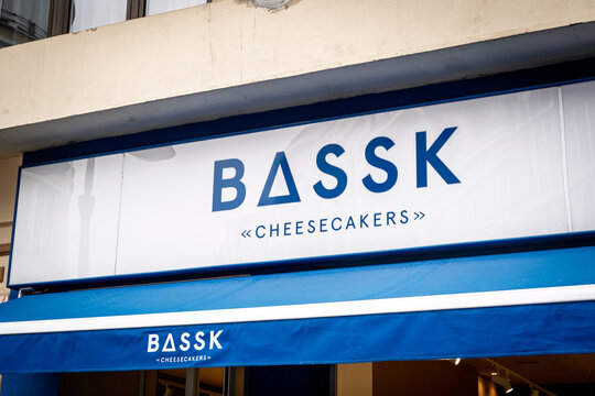 VALENCIA, SPAIN - FEBRUARY 28, 2026: Bassk Cheesecakers sign in Valencia, Spain, showing a shop focused on Basque cheesecake, desserts, bakery products, food branding and specialty retail.