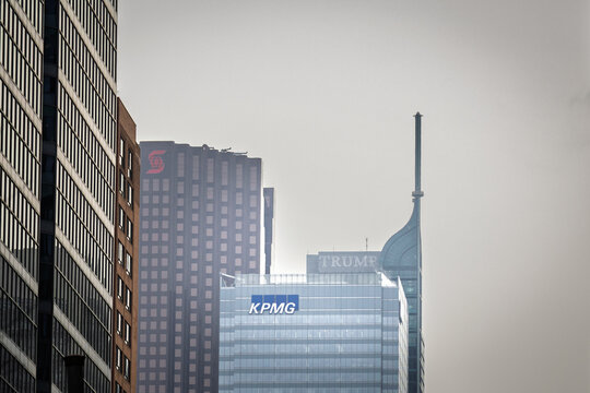 TORONTO, CANADA - DECEMBER 21, 2016: KPMG and Scotiabank logos in downtown Toronto near former Trump Tower, or Trump International Hotel and Tower Toronto, on finance, banking, commercial real estate.