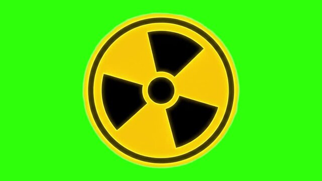 A bold black and yellow radiation hazard warning symbol is displayed against a solid green screen backdrop. This graphic is perfect for video editing, compositing, nuclear energy presentations, and wa
