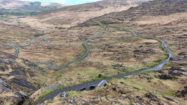 Ireland Epic Locations drone panning shot of the Healey pass on The Cork side snaking road up the mountain must drive on The Wild Atlantic Way