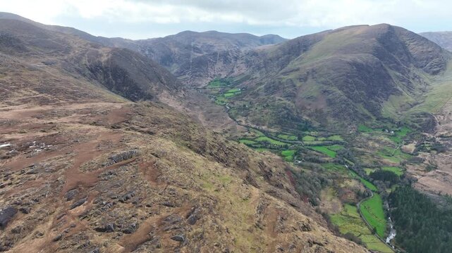 Ireland Epic Locations drone panning shot from the top of The Healey Pass wild Kerry Vistas and lake far below