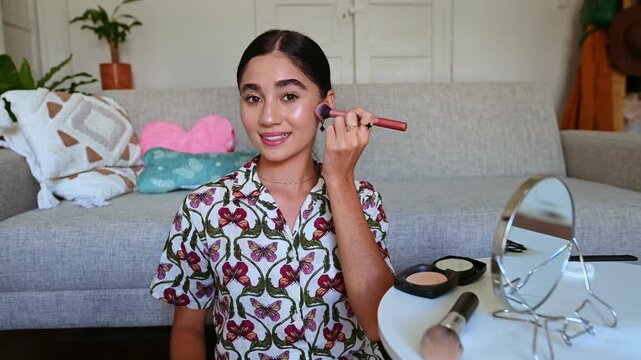 Teenager beauty blogger vlogging a makeup tutorial