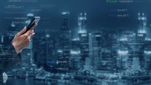 A programmer holds a smartphone while standing against a vibrant city skyline at night, surrounded by lines of code, symbolizing technology and connectivity in urban life. Xenic