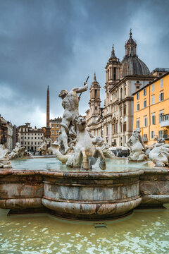 Fountain of Neptune in Piazza Navona at dawn, Rome, Italy