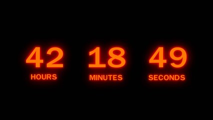 Digital clock counting down hours minutes seconds bright orange glow on black. © stock reality