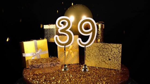Gold Number 39 with Gold Glitter Confetti Sparkles with Gifts and Balloons for Party Thirty Nine