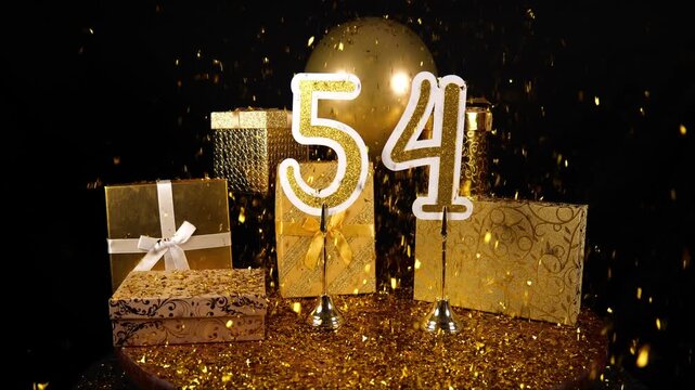 Gold Number 54 with Gold Glitter Confetti Sparkles with Gifts and Balloons for Party Fifty Four