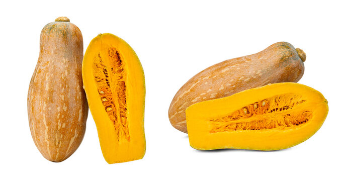 Close-up of Two Groups of Butternut Squash Whole and Halved on White Background