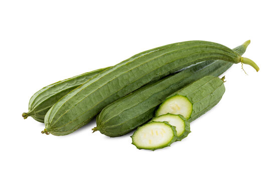 Fresh Luffa or Angled Loofah Whole and Sliced on White Background
