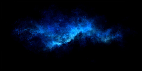 Abstract blue nebula gas cloud in deep space with star dust and cosmic energy and a dark black background. © Zìyóu