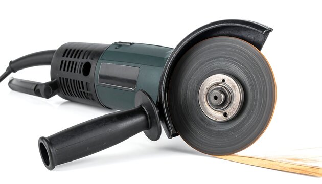 Close-up view of a black electric angle grinder tool.