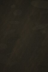 Fototapeta premium Dark textured background with subtle light spots