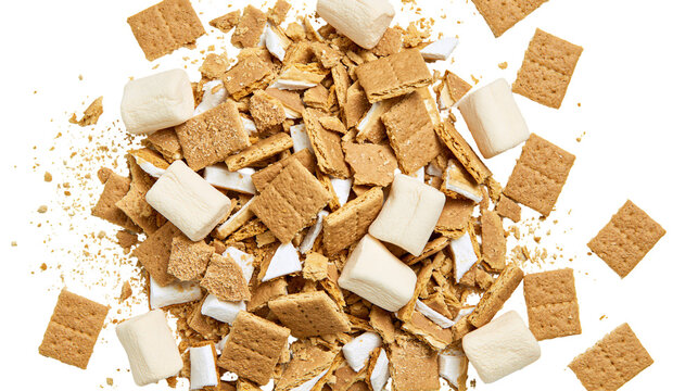 Crumbled graham crackers and marshmallows scattered, isolated on transparent background