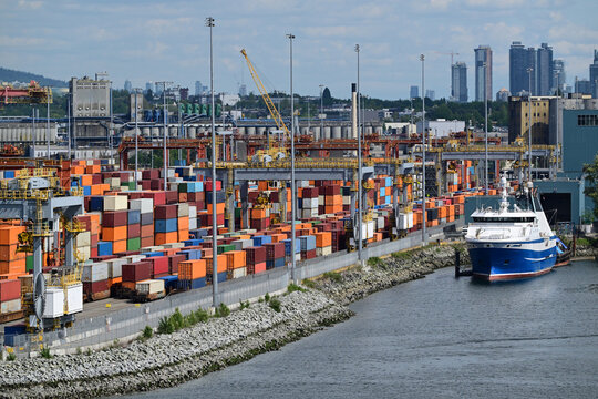 shipping containers stacked with exports and imports in Vancouver, Canada