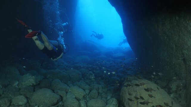cave dive underwater diving blue scuba divers exploring