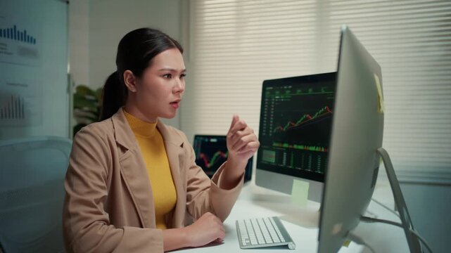 Anxious businesswoman feeling frustrated and desperate over stock market financial crash. Stressed investor analyzing trading data at night
