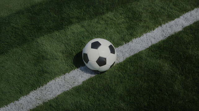 Soccer ball resting on green artificial turf beside a white boundary line football sports equipment game